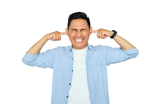 Annoyed young Asian man in casual clothes plugging ears with fingers, irritated by loud noise isolated on transparent background