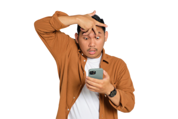 Portrait of young Asian man in casual shirt trying to stay awake to read news on smartphone isolated on transparent background