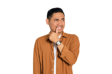 Handsome young Asian man in casual shirt looking nervous with finger in mouth isolated on transparent background