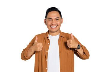 Smiling young Asian man in casual shirt showing thumbs up or like isolated on transparent background