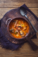 Pizza soup with vegetables, mushrooms and minced meat, minestrone