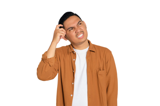 Pensive young Asian man in casual shirt scratching his temple with finger, looking up trying hard to remember something isolated on transparent background - Powered by Adobe