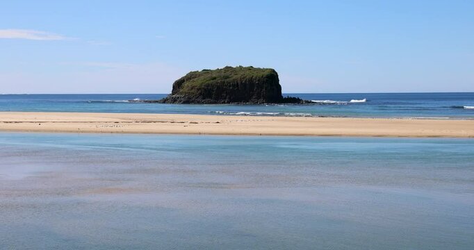 Rangoon Island (or Stack Island), is a large basalt rock formation located at the mouth of the Minnamurra River, just north of Kiama on the NSW South Coast. 