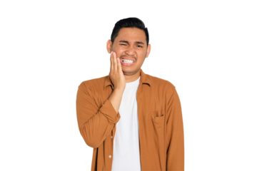 Dental problems. Unhappy young Asian man in casual shirt suffering from severe toothache, touching his cheek isolated on transparent background