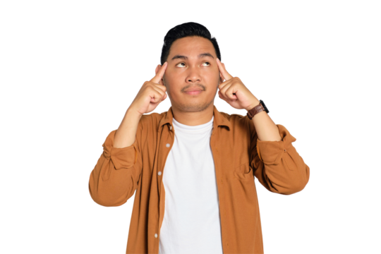 Doubtful young Asian man in casual shirt put his finger on his temple, trying to remember something isolated on transparent background