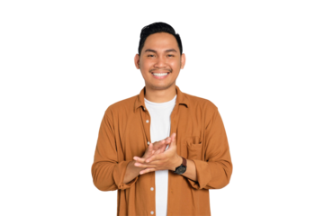 Smiling young Asian man in casual shirt clapping hands, congratulating someone isolated on transparent background