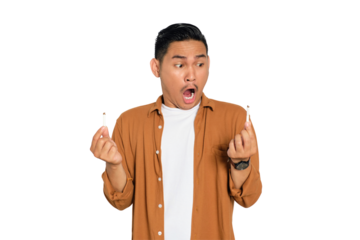 Quit smoking. Angry young Asian man in casual shirt breaking cigarette and saying no to smoking isolated on transparent background