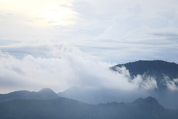 clouds in the mountains, the landscape in the gloomy faded colors of dawn