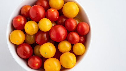 Bowl of Fresh Red and Yellow Cherry Tomatoes on White Background, Colorful Healthy Snack