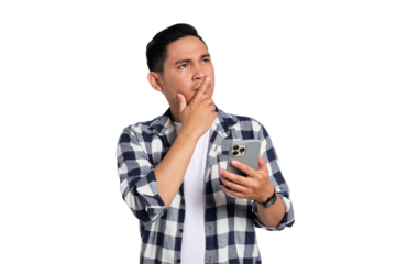 Pensive young Asian man in casual shirt holding smartphone, looking aside at copy space, thinking about offer isolated on transparent background