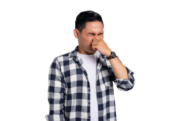 Young Asian man in casual shirt holding breath with finger on nose, smelling something stinky and disgusting isolated on transparent background