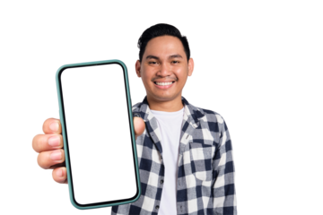 Happy young Asian man in casual shirt holding smartphone with blank screen isolated on transparent background