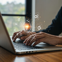  Person Using Holographic Digital Icons on Laptop