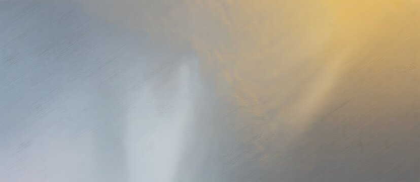 Abstract textured background with soft blue and warm golden gradient