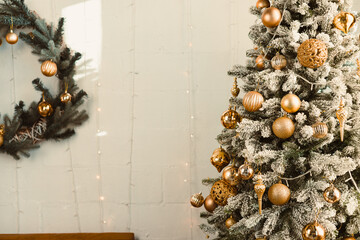 Immerse in Winter Wonderlands magic a grand golden Christmas tree and a beautiful wreath create a...