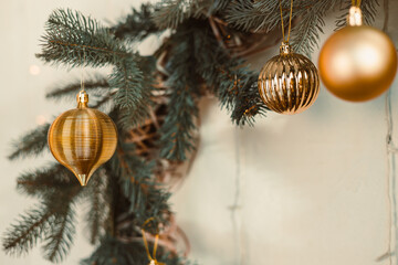 Elegant Gold Christmas Ornaments swing from vibrant Greenery, perfect for crafting magical Holiday...