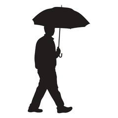 silhouette of a person walking with an umbrella 