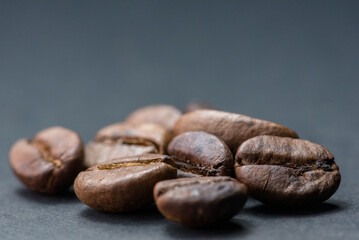 Close up of coffee beans are the background.