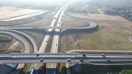 Aerial view highway intersection with looping ramps