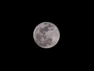 full moon over black sky