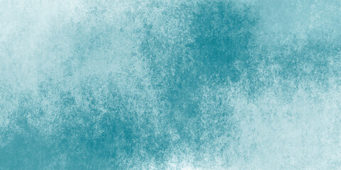 Subtle grunge brush pattern in light blue background

