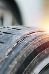Close-up of old car tire with cracks