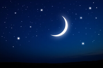Naklejka premium Bright crescent moon shines in a deep blue starry night sky over a dark horizon