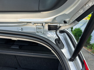 A comprehensive and detailed view of the car trunk mechanism is available, showcasing the...