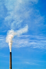 Smoking Factory Chimney pumping out pollution into the atmosphere, Banja Luka, Bosnia Herzegovina, Eastern Europe