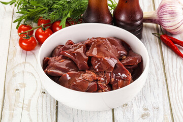 Raw chicken liver uncooked in the bowl