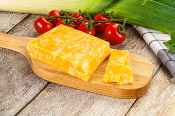 Marble yellow cheese with slices