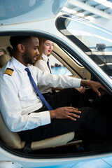 Student pilots training inside aircraft cockpit simulator © alvaro