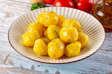 Boiled young potato with oil