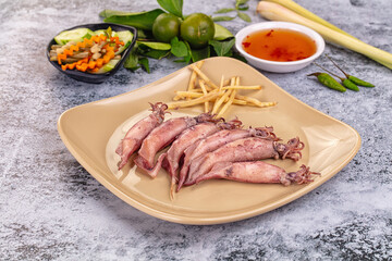 Boiled wild mini calamari snack