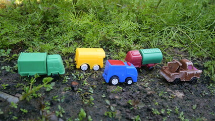 Children's toy vehicles explore rainforest trails, inspiring adventure, imagination, and outdoor jungle play experiences.