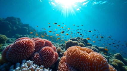 A vibrant underwater macro shot capturing the intricate beauty of a coral reef teeming with neon-colored fish, illuminated by sunlight filtering through the tropical ocean.
