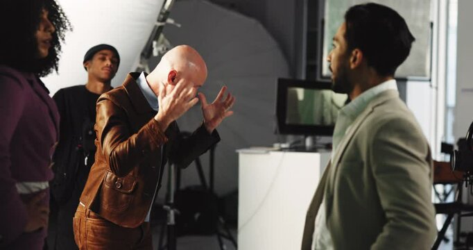 Angry actor, production team and people in studio for problem, poor script or bad writing. Frustrated group, set or behind the scenes for fail, scream or throw paper for performance anxiety or stress