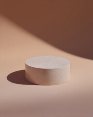 Round Stone Pedestal on Solid White Background with Soft Lighting