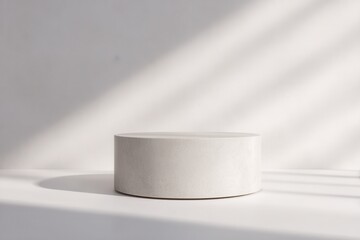 Round Stone Pedestal on Solid White Background with Soft Lighting
