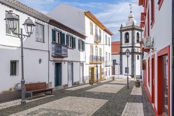 Cobblestone street in Velas, Azores, creating perfect perspective leading directly to historic...