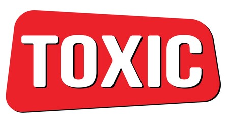 TOXIC text on red trapeze stamp sign.