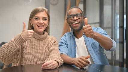 Portrait of Young Casual People Doing Thumbs up
