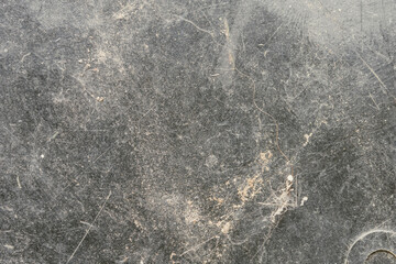 Close-up photograph of a gray, textured surface. Classic, elegant and charming textured background...