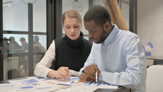 Business People Working on Business Report, Doing Paperwork