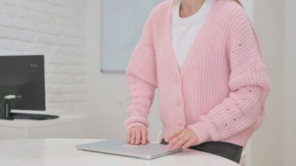 Creative Young Woman Coming to Work