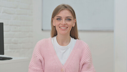 Portrait of Smiling Creative Young Woman