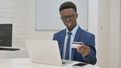 Businessman Frustrated with Online Purchase