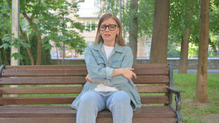 Crying Anxious Woman Sitting Outdoor on Bench