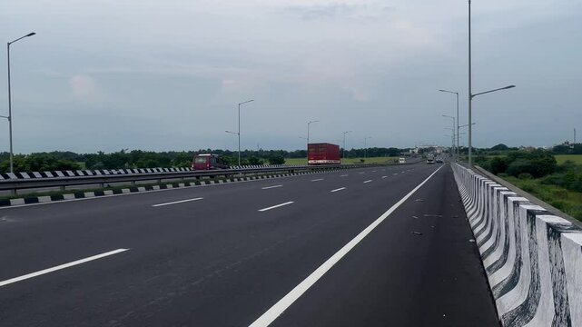 Long Highway Flyover Stretching Across Urban Cityscape Vie.