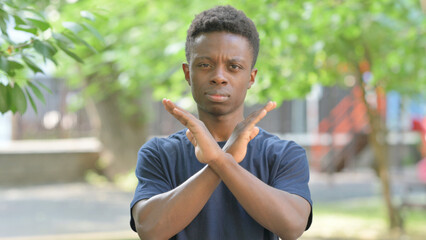 Casual African Man Making Stop Gesture Outdoors